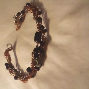 One of a kind hand made beaded bracelet. Made of crystals and copper